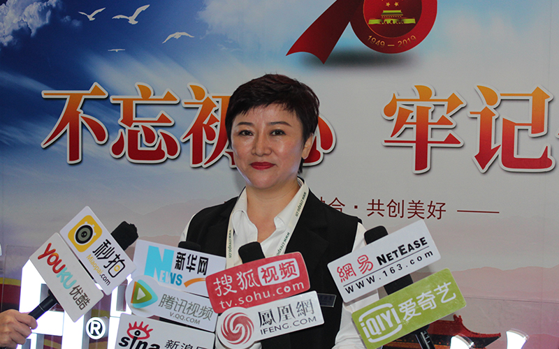 優秀肢體殘疾人代表愛心企業家姜惠接受媒體采訪
